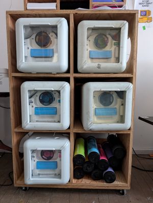 A bunch of riso inks in a shelf